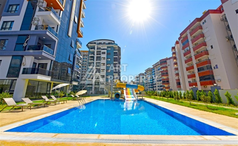 Квартира 1+1 с панорамным видом на горы в Махмутларе, 54 м², 600 м до моря - Ракурс 31