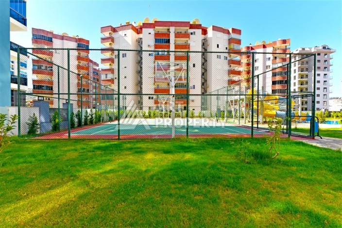 Квартира 1+1 с панорамным видом на горы в Махмутларе, 54 м², 600 м до моря - Ракурс 34