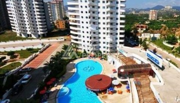 Квартира 2+1 с видом на море в популярном комплексе в Махмутларе, 110 м² - Ракурс 1