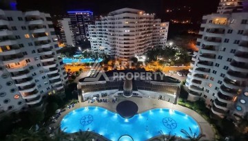 Квартира 2+1 с видом на море в популярном комплексе в Махмутларе, 110 м² - Ракурс 2