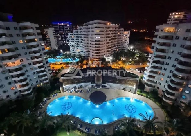 Квартира 2+1 с видом на море в популярном комплексе в Махмутларе, 110 м² - Ракурс 1