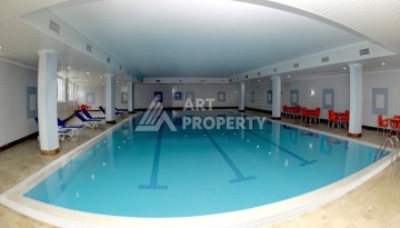 Квартира 2+1 с видом на море в популярном комплексе в Махмутларе, 110 м² - Ракурс 4