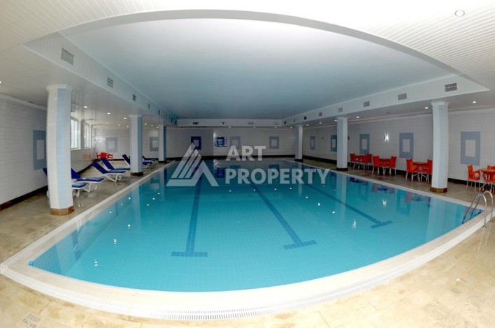 Квартира 2+1 с видом на море в популярном комплексе в Махмутларе, 110 м² - Ракурс 3