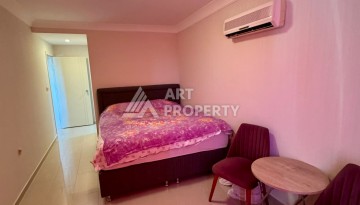 Квартира 2+1 с видом на море в популярном комплексе в Махмутларе, 110 м² - Ракурс 10