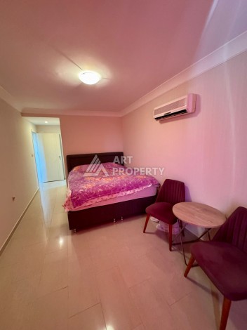 Квартира 2+1 с видом на море в популярном комплексе в Махмутларе, 110 м² - Ракурс 9