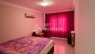 Квартира 2+1 с видом на море в популярном комплексе в Махмутларе, 110 м² - Ракурс 12