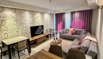 Квартира 2+1 с видом на море в популярном комплексе в Махмутларе, 110 м² - Ракурс 21