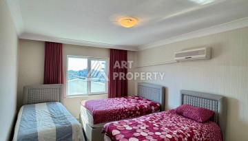 Квартира 2+1 с видом на море в популярном комплексе в Махмутларе, 110 м² - Ракурс 23