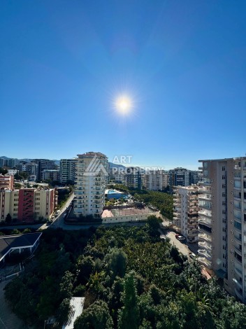 Квартира 2+1 с видом на море в популярном комплексе в Махмутларе, 110 м² - Ракурс 24