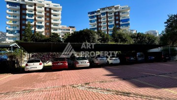 Квартира 2+1 с видом на море в популярном комплексе в Махмутларе, 110 м² - Ракурс 29