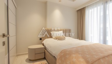 Квартира 1+1 на первой береговой линии в Махмутларе, 55 м², высокий арендный потенциал - Ракурс 8