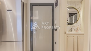 Квартира 1+1 на первой береговой линии в Махмутларе, 55 м², высокий арендный потенциал - Ракурс 13