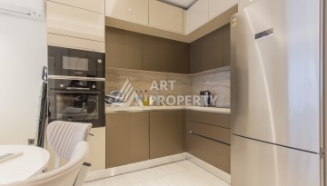 Квартира 1+1 на первой береговой линии в Махмутларе, 55 м², высокий арендный потенциал - Ракурс 14