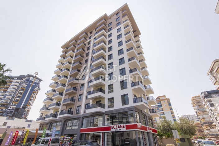 Квартира 1+1 в новом доме 2025 года в Махмутларе, 600 м до моря - Ракурс 0