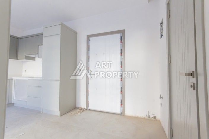 Квартира 1+1 в новом доме 2025 года в Махмутларе, 600 м до моря - Ракурс 3