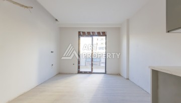 Квартира 1+1 в новом доме 2025 года в Махмутларе, 600 м до моря - Ракурс 9