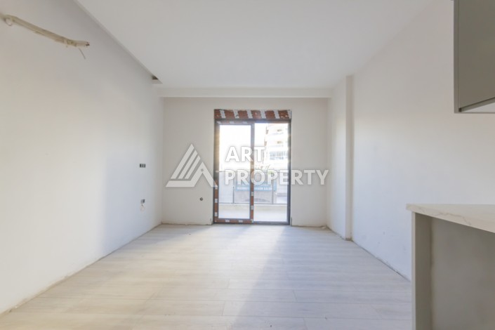 Квартира 1+1 в новом доме 2025 года в Махмутларе, 600 м до моря - Ракурс 8