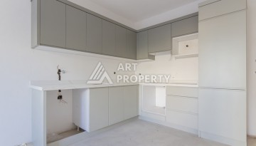 Квартира 1+1 в новом доме 2025 года в Махмутларе, 600 м до моря - Ракурс 11