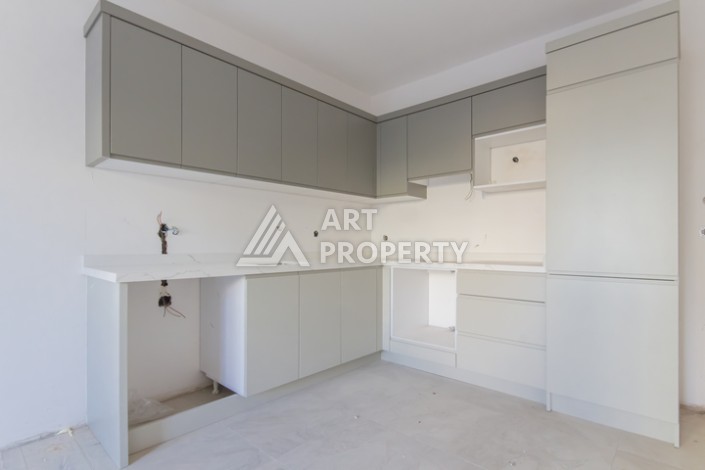 Квартира 1+1 в новом доме 2025 года в Махмутларе, 600 м до моря - Ракурс 10