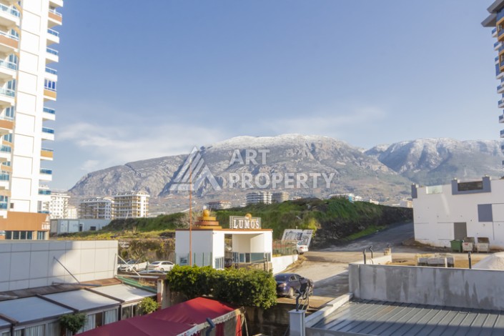 Квартира 1+1 в новом доме 2025 года в Махмутларе, 600 м до моря - Ракурс 13