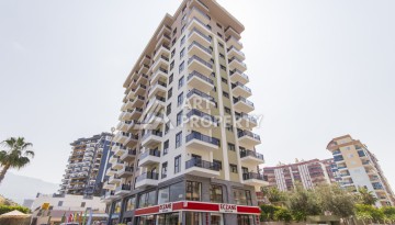 Квартира 1+1 в новом доме 2025 года в Махмутларе, 600 м до моря - Ракурс 15