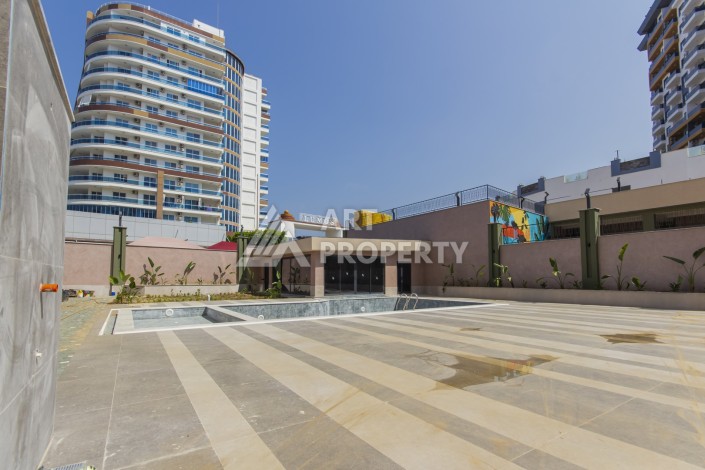 Квартира 1+1 в новом доме 2025 года в Махмутларе, 600 м до моря - Ракурс 16