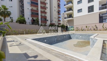 Квартира 1+1 в новом доме 2025 года в Махмутларе, 600 м до моря - Ракурс 18