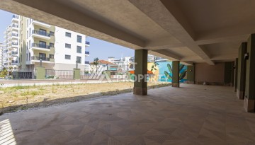 Квартира 1+1 в новом доме 2025 года в Махмутларе, 600 м до моря - Ракурс 21