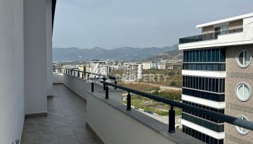 Эксклюзивный пентхаус 3+1 с потолками 3,5  м и панорамным видом на море и горы в Махмутларе - Ракурс 18