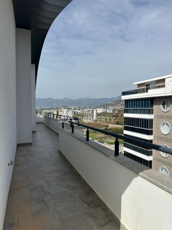 Эксклюзивный пентхаус 3+1 с потолками 3,5  м и панорамным видом на море и горы в Махмутларе - Ракурс 17