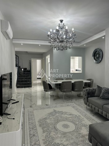 Эксклюзивный пентхаус 3+1 с потолками 3,5  м и панорамным видом на море и горы в Махмутларе - Ракурс 0