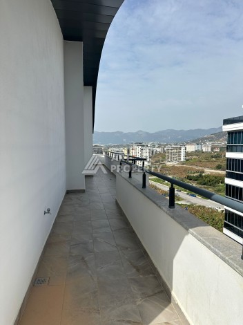 Эксклюзивный пентхаус 3+1 с потолками 3,5  м и панорамным видом на море и горы в Махмутларе - Ракурс 19