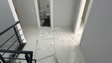 Эксклюзивный пентхаус 3+1 с потолками 3,5  м и панорамным видом на море и горы в Махмутларе - Ракурс 26