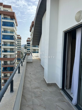 Эксклюзивный пентхаус 3+1 с потолками 3,5  м и панорамным видом на море и горы в Махмутларе - Ракурс 31