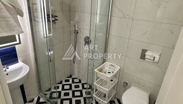 Эксклюзивный пентхаус 3+1 с потолками 3,5  м и панорамным видом на море и горы в Махмутларе - Ракурс 35