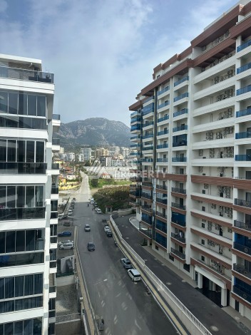 Эксклюзивный пентхаус 3+1 с потолками 3,5  м и панорамным видом на море и горы в Махмутларе - Ракурс 39