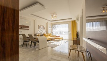 Просторная квартира 1+1 с видом на море и горы в Махмутларе, 75 м² - Ракурс 1