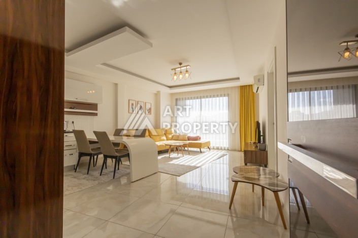 Просторная квартира 1+1 с видом на море и горы в Махмутларе, 75 м² - Ракурс 0