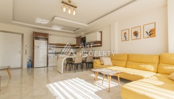 Просторная квартира 1+1 с видом на море и горы в Махмутларе, 75 м² - Ракурс 8