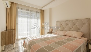 Просторная квартира 1+1 с видом на море и горы в Махмутларе, 75 м² - Ракурс 15