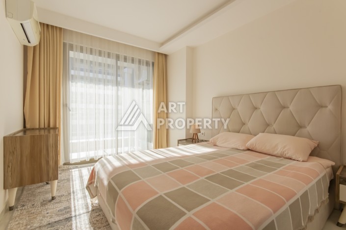 Просторная квартира 1+1 с видом на море и горы в Махмутларе, 75 м² - Ракурс 14