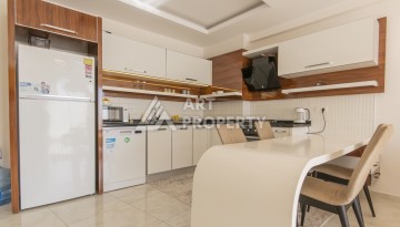 Просторная квартира 1+1 с видом на море и горы в Махмутларе, 75 м² - Ракурс 16