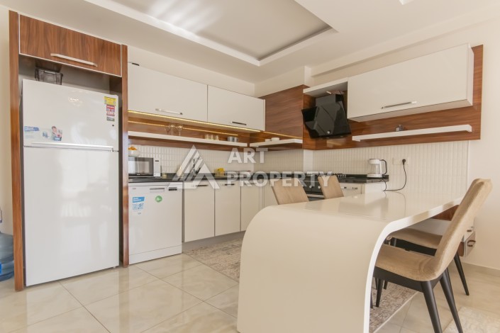 Просторная квартира 1+1 с видом на море и горы в Махмутларе, 75 м² - Ракурс 15