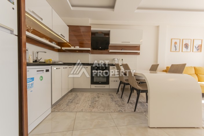 Просторная квартира 1+1 с видом на море и горы в Махмутларе, 75 м² - Ракурс 18