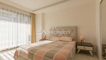 Просторная квартира 1+1 с видом на море и горы в Махмутларе, 75 м² - Ракурс 20