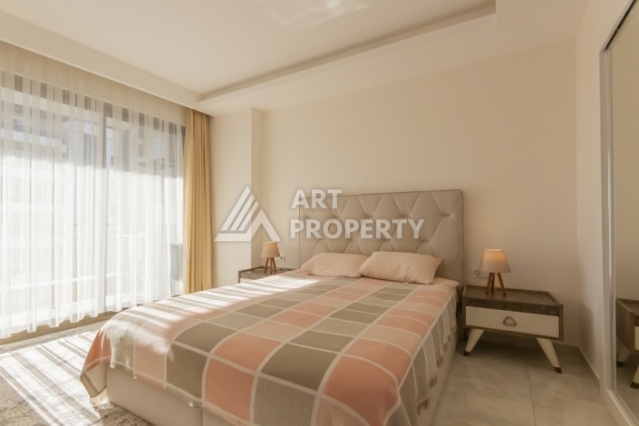 Просторная квартира 1+1 с видом на море и горы в Махмутларе, 75 м² - Ракурс 19