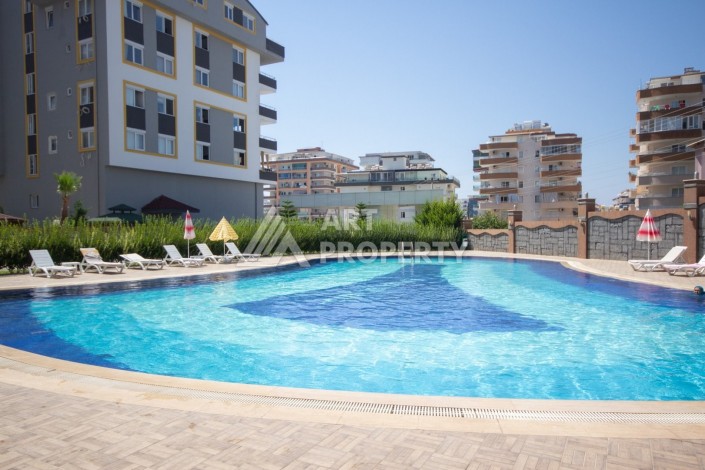 Просторная квартира 1+1 с видом на море и горы в Махмутларе, 75 м² - Ракурс 22