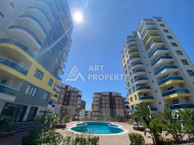 Большая квартира 1+1 с видом на море, 80 кв.м. Махмутлар, Алания - Ракурс 1