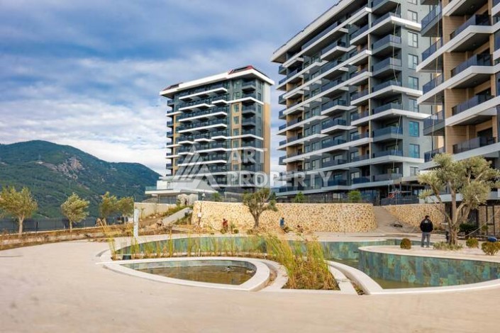 Квартира 1+1 с панорамным видом на море и горы, 53 кв.м. Кестель, Алания - Ракурс 7