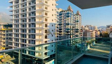 Красивые апартаменты 1+1 в элитном комплексе в районе Махмутлар, 60м2 - Ракурс 3